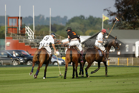 Pluma Negra (white) v Shoreline (black) in the Brecknock Cup Subsidiary final polo match played on Sunday 25 August 2013 at Cowdray Park Polo Club on Ambersham 1. 2013.10.12 www.polopictures.co.uk