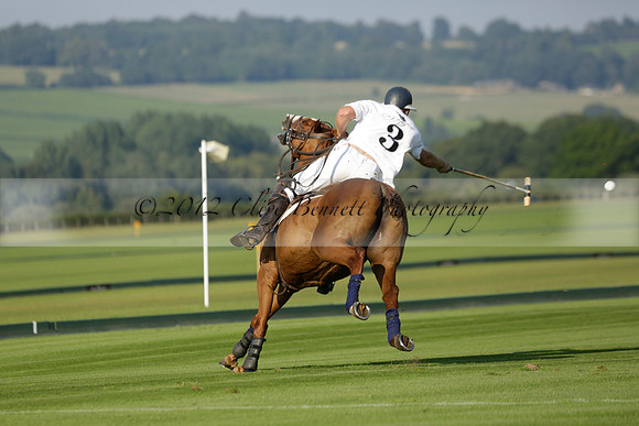 Pluma Negra (white) v Shoreline (black) in the Brecknock Cup Subsidiary final polo match played on Sunday 25 August 2013 at Cowdray Park Polo Club on Ambersham 1. 2013.10.12 www.polopictures.co.uk