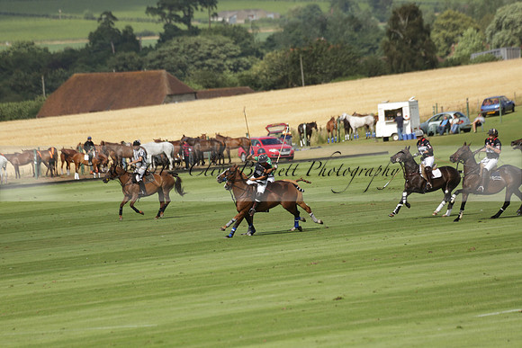 Jaeger Le Coultre (black)  v Wairakei Pastoral (white) in a Jaeger Le Coultre Holden White Cup polo match played on 29 July 2013 at Cowdray Park Polo Club on Brooksfieldwww.polopictures.co.uk