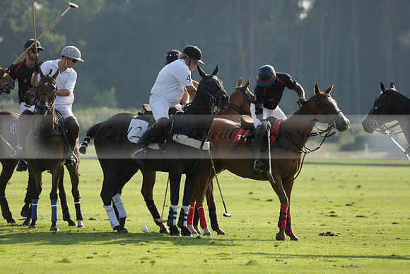 Pluma Negra (white) v Shoreline (black) in the Brecknock Cup Subsidiary final polo match played on Sunday 25 August 2013 at Cowdray Park Polo Club on Ambersham 1. 2013.10.12 www.polopictures.co.uk