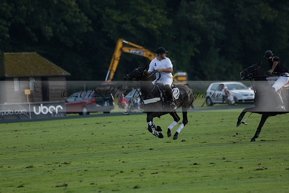 Pluma Negra (white) v Shoreline (black) in the Brecknock Cup Subsidiary final polo match played on Sunday 25 August 2013 at Cowdray Park Polo Club on Ambersham 1. 2013.10.12 www.polopictures.co.uk