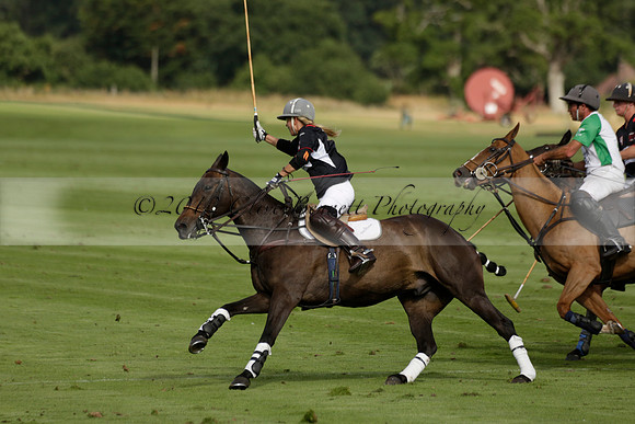 Jaeger Le Coultre (black)  v Wairakei Pastoral (white) in a Jaeger Le Coultre Holden White Cup polo match played on 29 July 2013 at Cowdray Park Polo Club on Brooksfieldwww.polopictures.co.uk