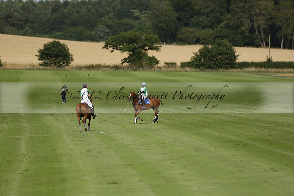 Jaeger Le Coultre (black)  v Wairakei Pastoral (white) in a Jaeger Le Coultre Holden White Cup polo match played on 29 July 2013 at Cowdray Park Polo Club on Brooksfieldwww.polopictures.co.uk