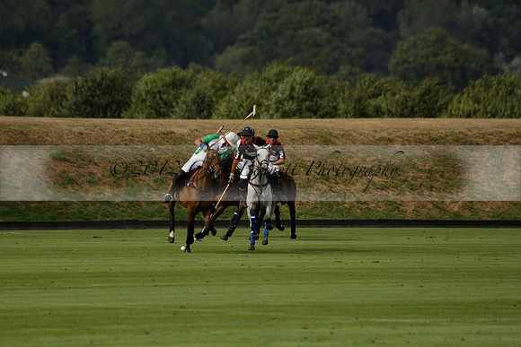 Jaeger Le Coultre (black)  v Wairakei Pastoral (white) in a Jaeger Le Coultre Holden White Cup polo match played on 29 July 2013 at Cowdray Park Polo Club on Brooksfieldwww.polopictures.co.uk