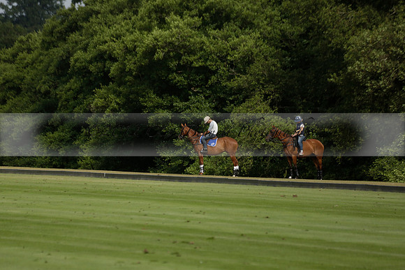 Jaeger Le Coultre (black)  v Wairakei Pastoral (white) in a Jaeger Le Coultre Holden White Cup polo match played on 29 July 2013 at Cowdray Park Polo Club on Brooksfieldwww.polopictures.co.uk