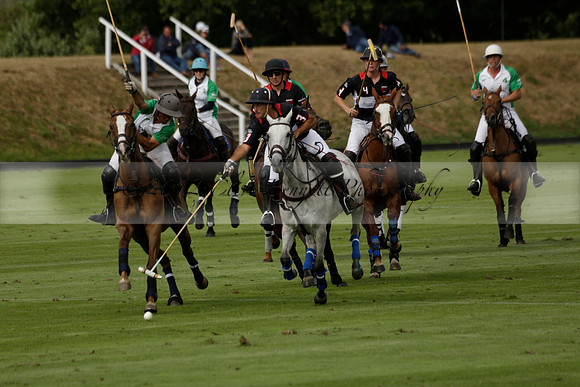 Jaeger Le Coultre (black)  v Wairakei Pastoral (white) in a Jaeger Le Coultre Holden White Cup polo match played on 29 July 2013 at Cowdray Park Polo Club on Brooksfieldwww.polopictures.co.uk
