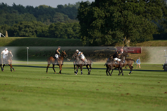 Pluma Negra (white) v Shoreline (black) in the Brecknock Cup Subsidiary final polo match played on Sunday 25 August 2013 at Cowdray Park Polo Club on Ambersham 1. 2013.10.12 www.polopictures.co.uk