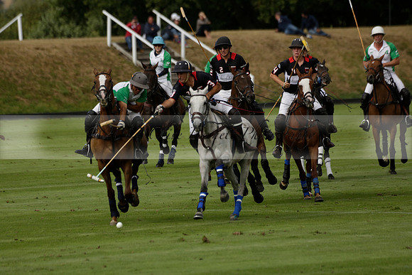 Jaeger Le Coultre (black)  v Wairakei Pastoral (white) in a Jaeger Le Coultre Holden White Cup polo match played on 29 July 2013 at Cowdray Park Polo Club on Brooksfieldwww.polopictures.co.uk