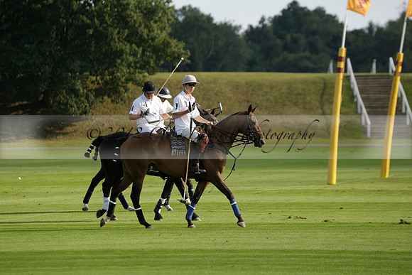 Pluma Negra (white) v Shoreline (black) in the Brecknock Cup Subsidiary final polo match played on Sunday 25 August 2013 at Cowdray Park Polo Club on Ambersham 1. 2013.10.12 www.polopictures.co.uk