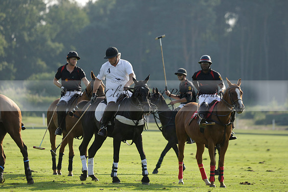 Pluma Negra (white) v Shoreline (black) in the Brecknock Cup Subsidiary final polo match played on Sunday 25 August 2013 at Cowdray Park Polo Club on Ambersham 1. 2013.10.12 www.polopictures.co.uk