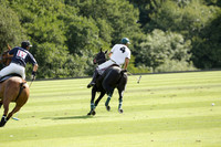 Pandas (white) v Home Farm (navy) in a Park House West Sussex Cup Polo match on Brooksfield at Cowdray Park Polo Club on Friday 30 August 2013. 2013.08.30 www.polopictures.co.uk