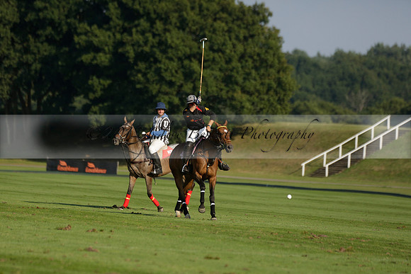 Pluma Negra (white) v Shoreline (black) in the Brecknock Cup Subsidiary final polo match played on Sunday 25 August 2013 at Cowdray Park Polo Club on Ambersham 1. 2013.10.12 www.polopictures.co.uk