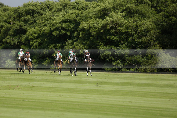Jaeger Le Coultre (black)  v Wairakei Pastoral (white) in a Jaeger Le Coultre Holden White Cup polo match played on 29 July 2013 at Cowdray Park Polo Club on Brooksfieldwww.polopictures.co.uk