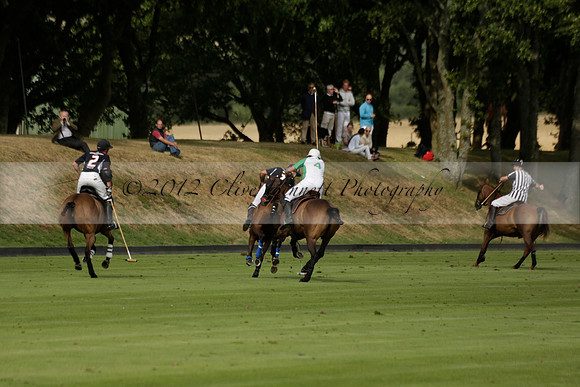 Jaeger Le Coultre (black)  v Wairakei Pastoral (white) in a Jaeger Le Coultre Holden White Cup polo match played on 29 July 2013 at Cowdray Park Polo Club on Brooksfieldwww.polopictures.co.uk