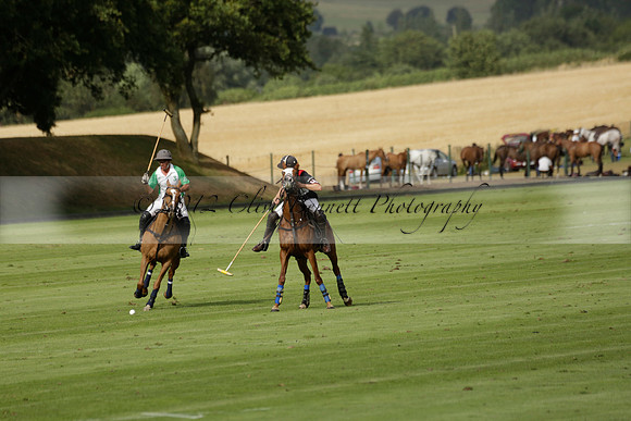 Jaeger Le Coultre (black)  v Wairakei Pastoral (white) in a Jaeger Le Coultre Holden White Cup polo match played on 29 July 2013 at Cowdray Park Polo Club on Brooksfieldwww.polopictures.co.uk