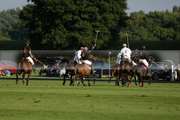 Pluma Negra (white) v Shoreline (black) in the Brecknock Cup Subsidiary final polo match played on Sunday 25 August 2013 at Cowdray Park Polo Club on Ambersham 1. 2013.10.12 www.polopictures.co.uk
