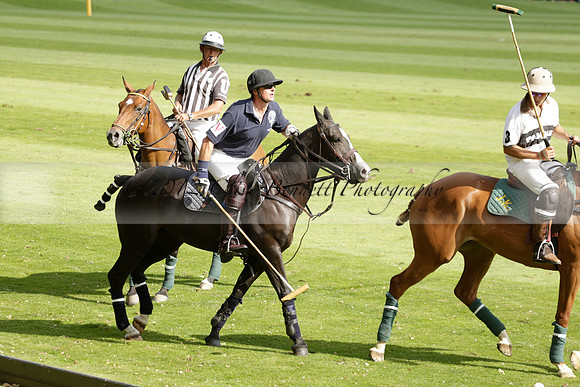 Pandas (white) v Home Farm (navy) in a Park House West Sussex Cup Polo match on Brooksfield at Cowdray Park Polo Club on Friday 30 August 2013. 2013.08.30 www.polopictures.co.uk