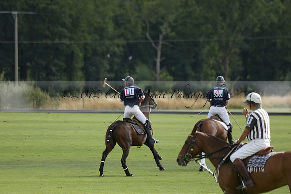 Pandas (white) v Home Farm (navy) in a Park House West Sussex Cup Polo match on Brooksfield at Cowdray Park Polo Club on Friday 30 August 2013. 2013.08.30 www.polopictures.co.uk