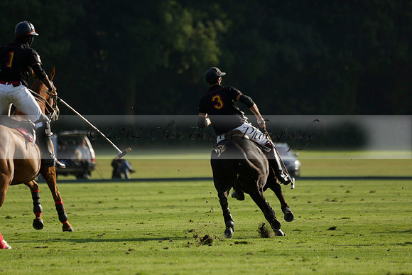 Pluma Negra (white) v Shoreline (black) in the Brecknock Cup Subsidiary final polo match played on Sunday 25 August 2013 at Cowdray Park Polo Club on Ambersham 1. 2013.10.12 www.polopictures.co.uk