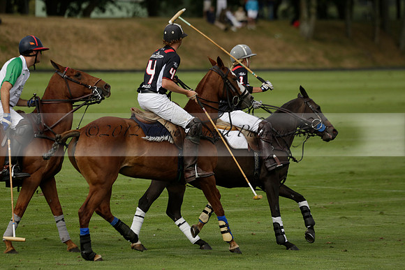 Jaeger Le Coultre (black)  v Wairakei Pastoral (white) in a Jaeger Le Coultre Holden White Cup polo match played on 29 July 2013 at Cowdray Park Polo Club on Brooksfieldwww.polopictures.co.uk