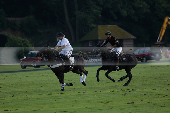 Pluma Negra (white) v Shoreline (black) in the Brecknock Cup Subsidiary final polo match played on Sunday 25 August 2013 at Cowdray Park Polo Club on Ambersham 1. 2013.10.12 www.polopictures.co.uk