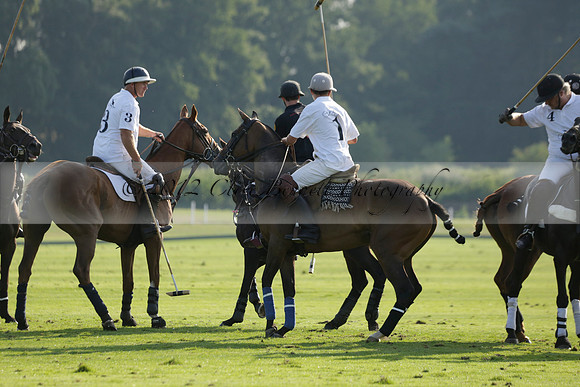 Pluma Negra (white) v Shoreline (black) in the Brecknock Cup Subsidiary final polo match played on Sunday 25 August 2013 at Cowdray Park Polo Club on Ambersham 1. 2013.10.12 www.polopictures.co.uk