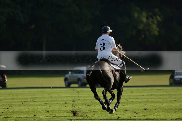 Pluma Negra (white) v Shoreline (black) in the Brecknock Cup Subsidiary final polo match played on Sunday 25 August 2013 at Cowdray Park Polo Club on Ambersham 1. 2013.10.12 www.polopictures.co.uk