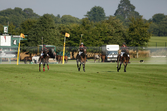 Pluma Negra (white) v Shoreline (black) in the Brecknock Cup Subsidiary final polo match played on Sunday 25 August 2013 at Cowdray Park Polo Club on Ambersham 1. 2013.10.12 www.polopictures.co.uk