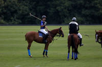 Ghost Chilli (blue) v Somerton (pale blue) in a Lodsworth 4 Goal polo match played on Sunday 25 August 2013 at Cowdray Park Polo Club on Brooksfield. 2013.10.12 www.polopictures.co.uk