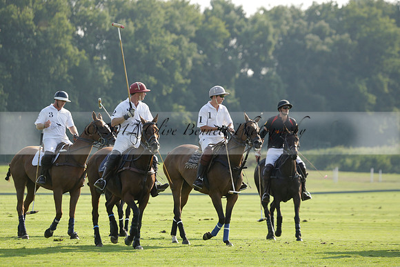 Pluma Negra (white) v Shoreline (black) in the Brecknock Cup Subsidiary final polo match played on Sunday 25 August 2013 at Cowdray Park Polo Club on Ambersham 1. 2013.10.12 www.polopictures.co.uk