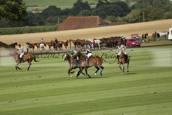 Jaeger Le Coultre (black)  v Wairakei Pastoral (white) in a Jaeger Le Coultre Holden White Cup polo match played on 29 July 2013 at Cowdray Park Polo Club on Brooksfieldwww.polopictures.co.uk