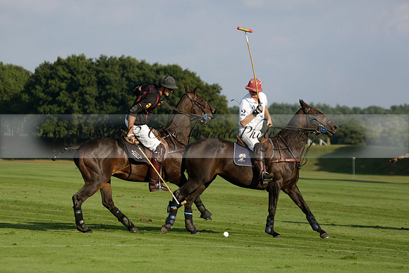 Pluma Negra (white) v Shoreline (black) in the Brecknock Cup Subsidiary final polo match played on Sunday 25 August 2013 at Cowdray Park Polo Club on Ambersham 1. 2013.10.12 www.polopictures.co.uk