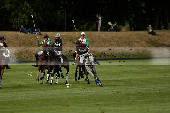 Jaeger Le Coultre (black)  v Wairakei Pastoral (white) in a Jaeger Le Coultre Holden White Cup polo match played on 29 July 2013 at Cowdray Park Polo Club on Brooksfieldwww.polopictures.co.uk