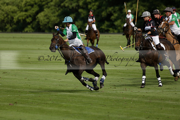 Jaeger Le Coultre (black)  v Wairakei Pastoral (white) in a Jaeger Le Coultre Holden White Cup polo match played on 29 July 2013 at Cowdray Park Polo Club on Brooksfieldwww.polopictures.co.uk