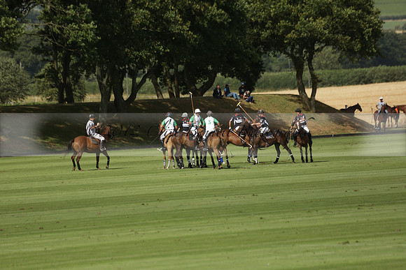 Jaeger Le Coultre (black)  v Wairakei Pastoral (white) in a Jaeger Le Coultre Holden White Cup polo match played on 29 July 2013 at Cowdray Park Polo Club on Brooksfieldwww.polopictures.co.uk