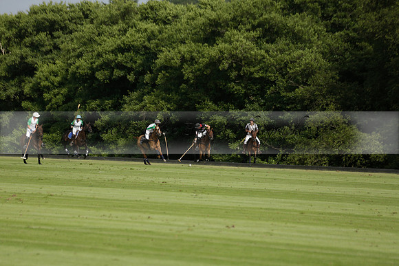 Jaeger Le Coultre (black)  v Wairakei Pastoral (white) in a Jaeger Le Coultre Holden White Cup polo match played on 29 July 2013 at Cowdray Park Polo Club on Brooksfieldwww.polopictures.co.uk