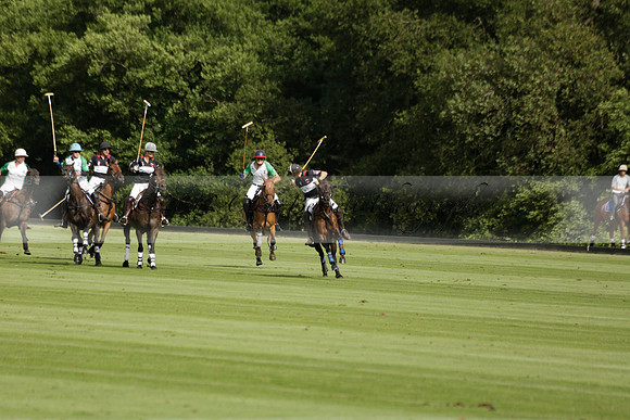 Jaeger Le Coultre (black)  v Wairakei Pastoral (white) in a Jaeger Le Coultre Holden White Cup polo match played on 29 July 2013 at Cowdray Park Polo Club on Brooksfieldwww.polopictures.co.uk