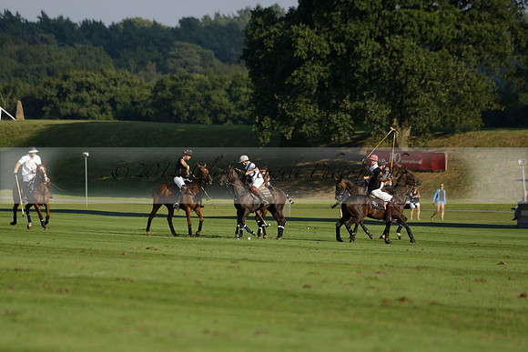 Pluma Negra (white) v Shoreline (black) in the Brecknock Cup Subsidiary final polo match played on Sunday 25 August 2013 at Cowdray Park Polo Club on Ambersham 1. 2013.10.12 www.polopictures.co.uk