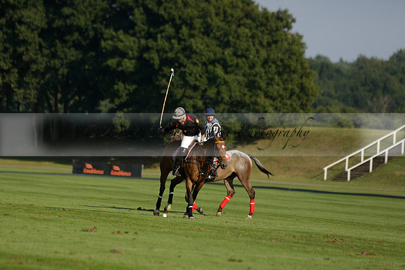 Pluma Negra (white) v Shoreline (black) in the Brecknock Cup Subsidiary final polo match played on Sunday 25 August 2013 at Cowdray Park Polo Club on Ambersham 1. 2013.10.12 www.polopictures.co.uk