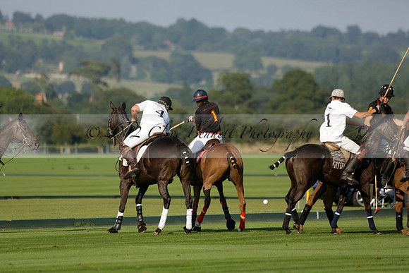 Pluma Negra (white) v Shoreline (black) in the Brecknock Cup Subsidiary final polo match played on Sunday 25 August 2013 at Cowdray Park Polo Club on Ambersham 1. 2013.10.12 www.polopictures.co.uk