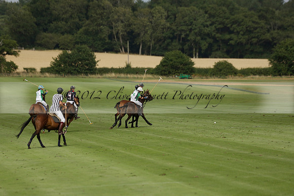 Jaeger Le Coultre (black)  v Wairakei Pastoral (white) in a Jaeger Le Coultre Holden White Cup polo match played on 29 July 2013 at Cowdray Park Polo Club on Brooksfieldwww.polopictures.co.uk