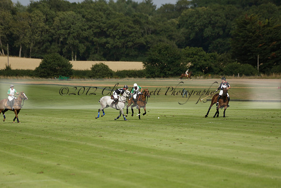 Jaeger Le Coultre (black)  v Wairakei Pastoral (white) in a Jaeger Le Coultre Holden White Cup polo match played on 29 July 2013 at Cowdray Park Polo Club on Brooksfieldwww.polopictures.co.uk
