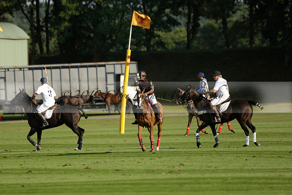 Pluma Negra (white) v Shoreline (black) in the Brecknock Cup Subsidiary final polo match played on Sunday 25 August 2013 at Cowdray Park Polo Club on Ambersham 1. 2013.10.12 www.polopictures.co.uk