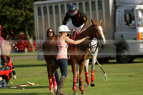 Pluma Negra (white) v Shoreline (black) in the Brecknock Cup Subsidiary final polo match played on Sunday 25 August 2013 at Cowdray Park Polo Club on Ambersham 1. 2013.10.12 www.polopictures.co.uk