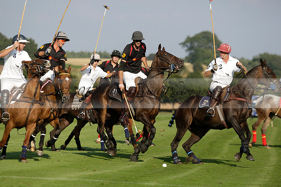 Pluma Negra (white) v Shoreline (black) in the Brecknock Cup Subsidiary final polo match played on Sunday 25 August 2013 at Cowdray Park Polo Club on Ambersham 1. 2013.10.12 www.polopictures.co.uk