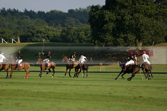 Pluma Negra (white) v Shoreline (black) in the Brecknock Cup Subsidiary final polo match played on Sunday 25 August 2013 at Cowdray Park Polo Club on Ambersham 1. 2013.10.12 www.polopictures.co.uk