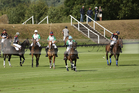 Jaeger Le Coultre (black)  v Wairakei Pastoral (white) in a Jaeger Le Coultre Holden White Cup polo match played on 29 July 2013 at Cowdray Park Polo Club on Brooksfieldwww.polopictures.co.uk