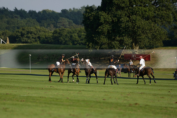 Pluma Negra (white) v Shoreline (black) in the Brecknock Cup Subsidiary final polo match played on Sunday 25 August 2013 at Cowdray Park Polo Club on Ambersham 1. 2013.10.12 www.polopictures.co.uk