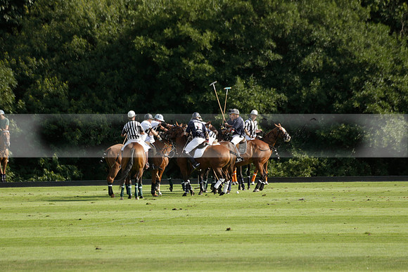 Pandas (white) v Home Farm (navy) in a Park House West Sussex Cup Polo match on Brooksfield at Cowdray Park Polo Club on Friday 30 August 2013. 2013.08.30 www.polopictures.co.uk