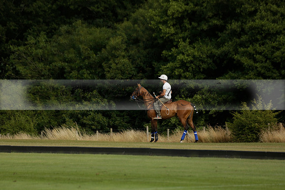Jaeger Le Coultre (black)  v Wairakei Pastoral (white) in a Jaeger Le Coultre Holden White Cup polo match played on 29 July 2013 at Cowdray Park Polo Club on Brooksfieldwww.polopictures.co.uk